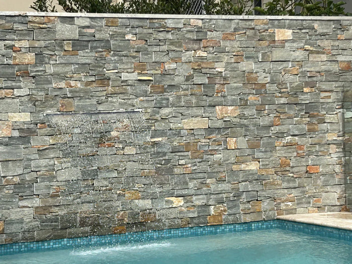 Natural stone wall cladding in dark grey