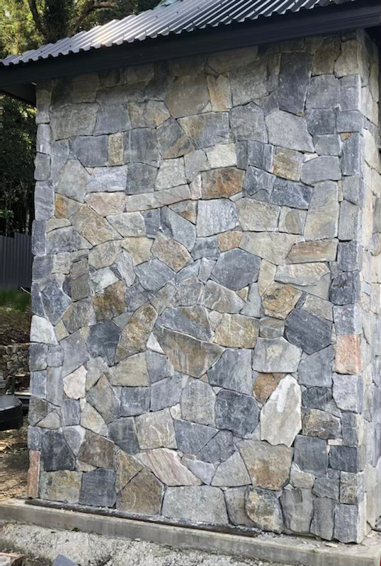 Free-form loose stone wall cladding in blue rustic quartz